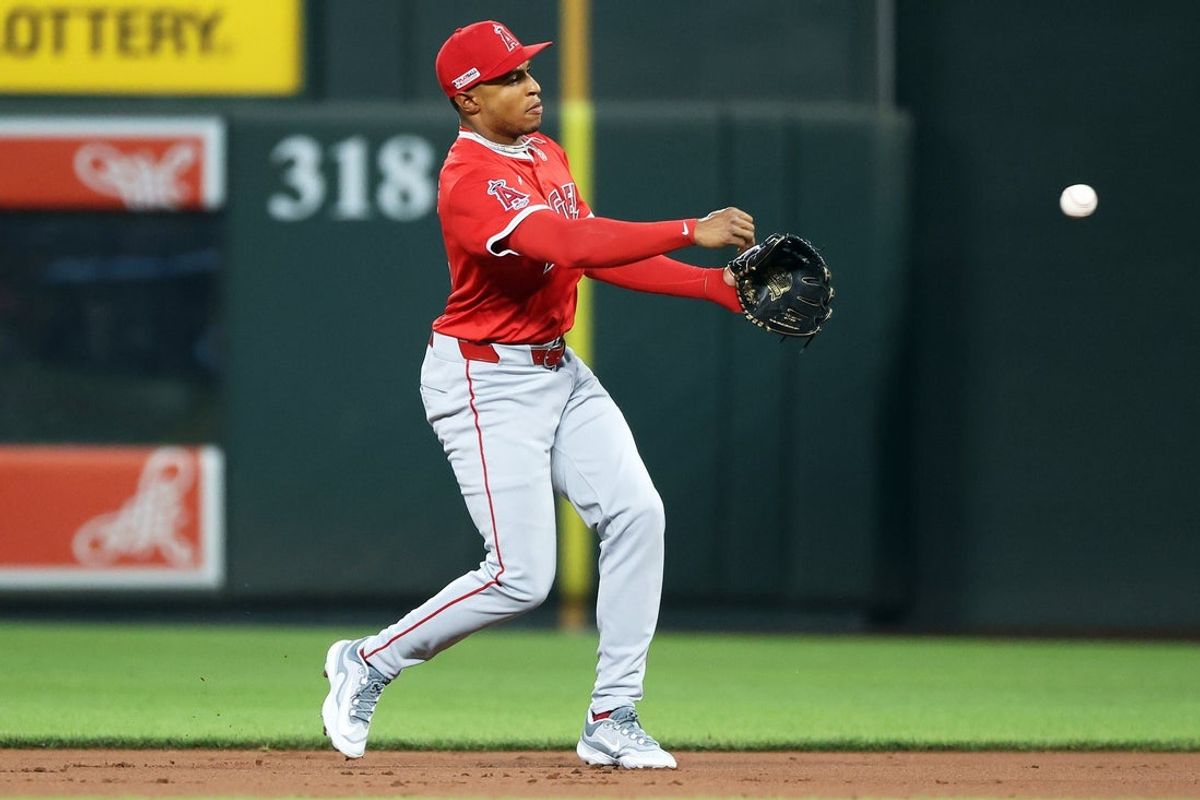 Jun 13, 2025; Baltimore, Maryland, USA; Los Angeles Angels second baseman Christian Moore (4) throws to first for an out during the first inning against the Baltimore Orioles at Oriole Park at Camden Yards. Mandatory Credit: Daniel Kucin Jr.-Imagn Images
