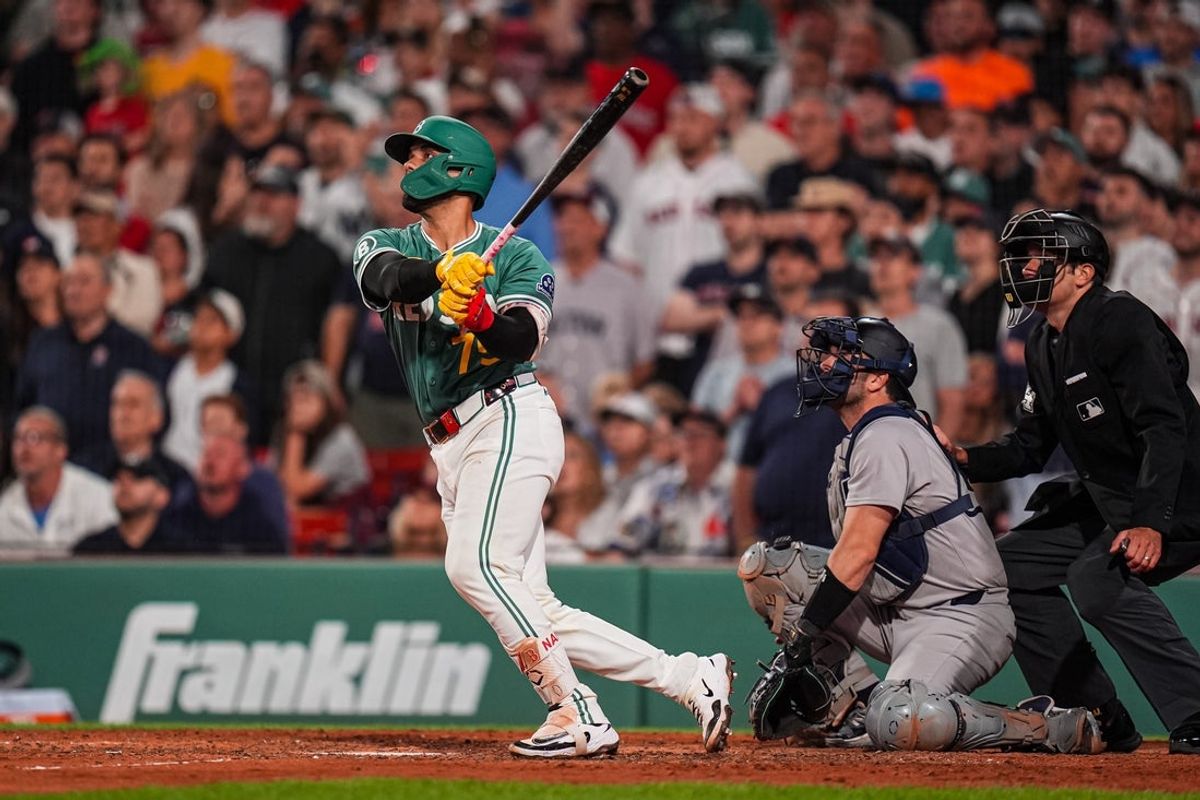 Jun 13, 2025; Boston, Massachusetts, USA; Boston Red Sox catcher Carlos Narváez (75) hits a game winning single to center field against the New York Yankees in the tenth inning at Fenway Park. Mandatory Credit: David Butler II-Imagn Images