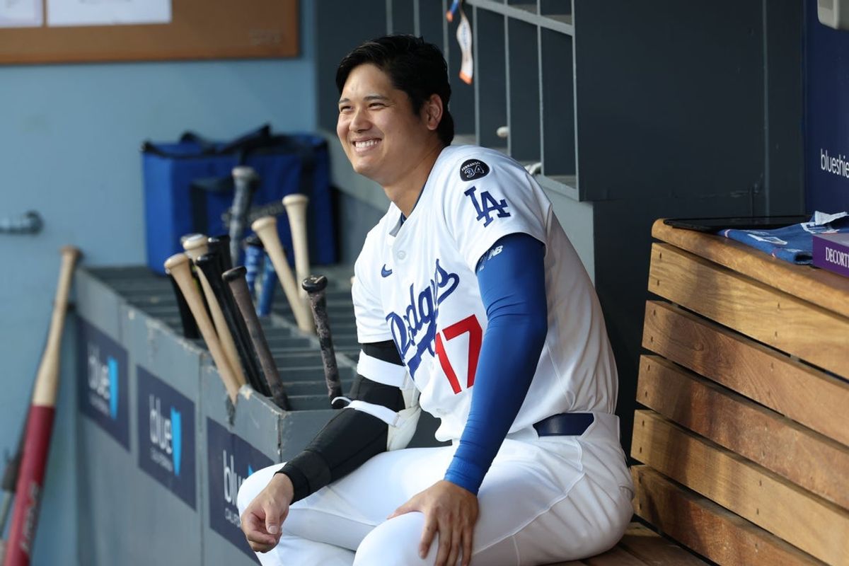 Jun 13, 2025; Los Angeles, California, USA; Los Angeles Dodgers designated hitter Shohei Ohtani (17) looks on in the dugout before the game against the San Francisco Giants at Dodger Stadium. Mandatory Credit: William Navarro-Imagn Images