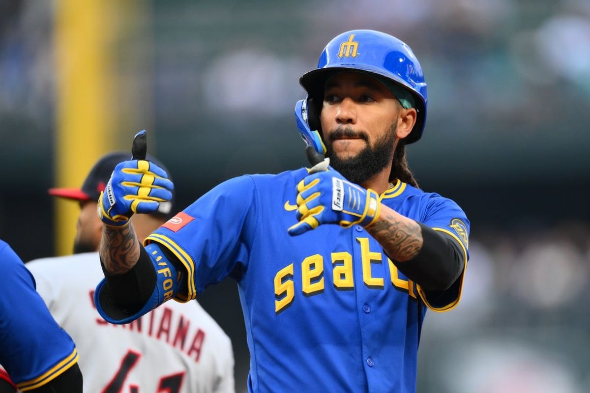 Jun 13, 2025; Seattle, Washington, USA; Seattle Mariners shortstop J.P. Crawford (3) celebrates after hitting a single against the Cleveland Guardians during the first inning at T-Mobile Park. Mandatory Credit: Steven Bisig-Imagn Images
