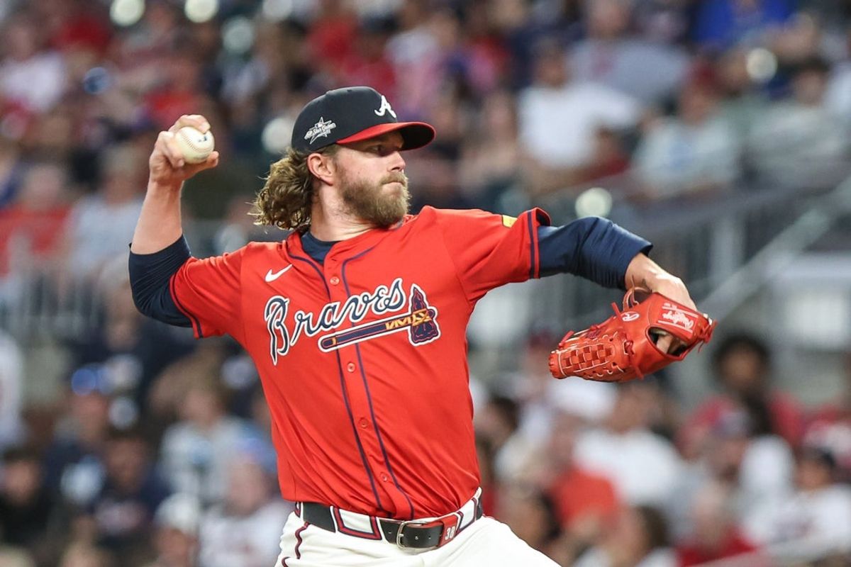 Jun 13, 2025; Cumberland, Georgia, USA; Atlanta Braves pitcher Pierce Johnson (38) pitches the ball against the Colorado Rockies during the fifth inning at Truist Park. Mandatory Credit: Jordan Godfree-Imagn Images