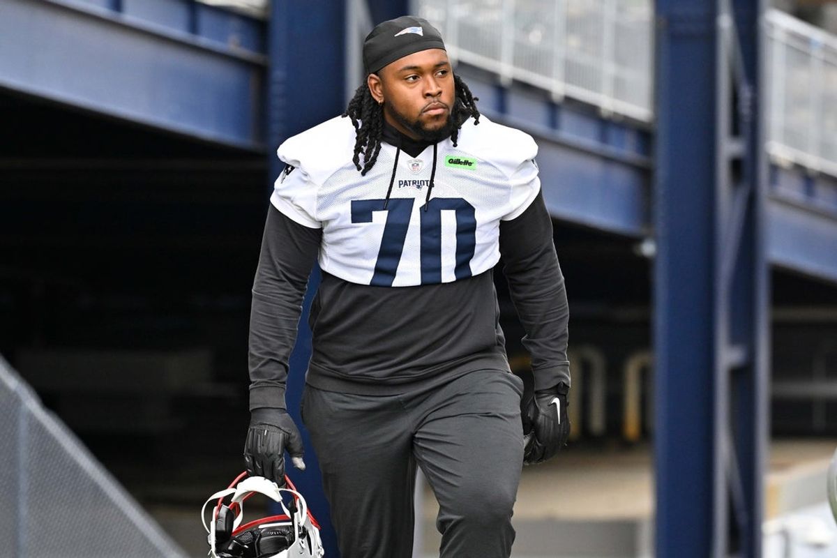 Jun 9, 2025; Foxborough, MA, USA; New England Patriots offensive tackle Caedan Wallace (70) walks to the practice fields at Gillette Stadium. Mandatory Credit: Eric Canha-Imagn Images
