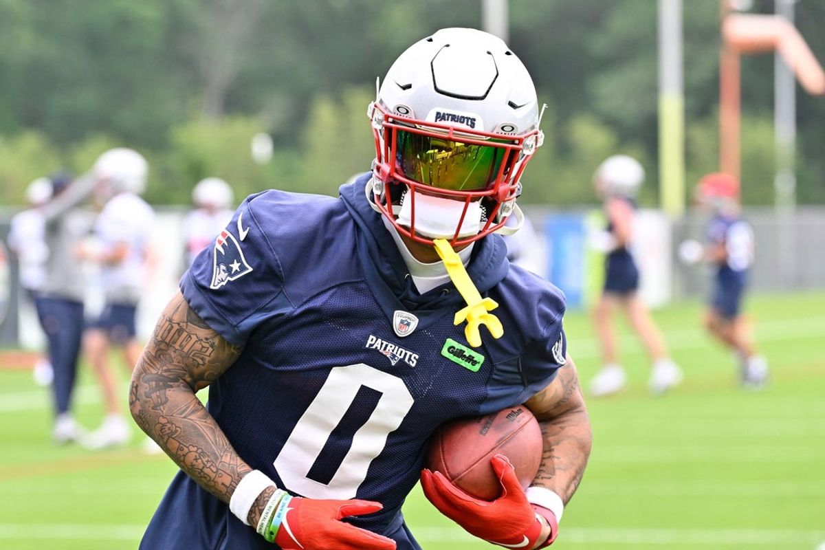 Jun 9, 2025; Foxborough, MA, USA; New England Patriots cornerback Christian Gonzalez (0) runs after the catch during minicamp at Gillette Stadium. Mandatory Credit: Eric Canha-Imagn Images