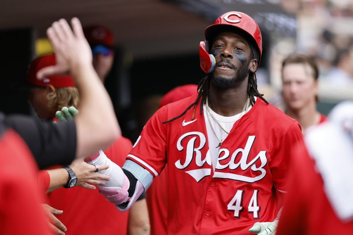 Jun 14, 2025; Detroit, Michigan, USA;  Cincinnati Reds shortstop Elly De La Cruz (44) receives congratulations from teammates after he hits a home run in the fourth inning against the Detroit Tigers at Comerica Park. Mandatory Credit: Rick Osentoski-Imagn Images