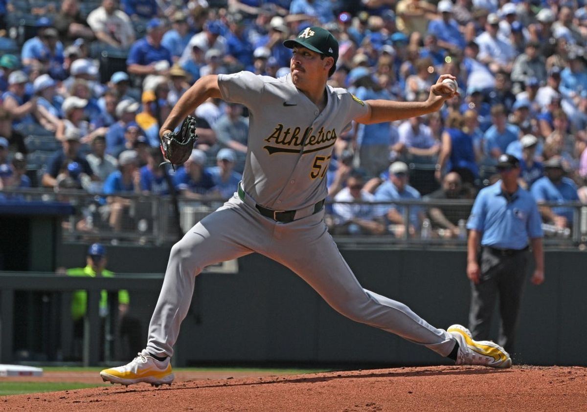Jun 14, 2025; Kansas City, Missouri, USA; Athletics starting pitcher Jacob Lopez (57) throws a pitch in the first inning against the Kansas City Royals at Kauffman Stadium. Mandatory Credit: Peter Aiken-Imagn Images