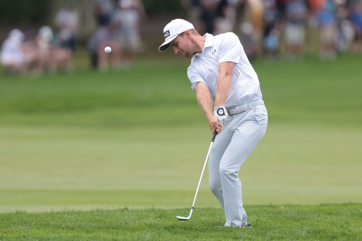 Jun 14, 2025; Oakmont, Pennsylvania, USA; Rasmus Neergaard-Petersen chips on the second green during the third round of the U.S. Open golf tournament. Mandatory Credit: Bill Streicher-Imagn Images