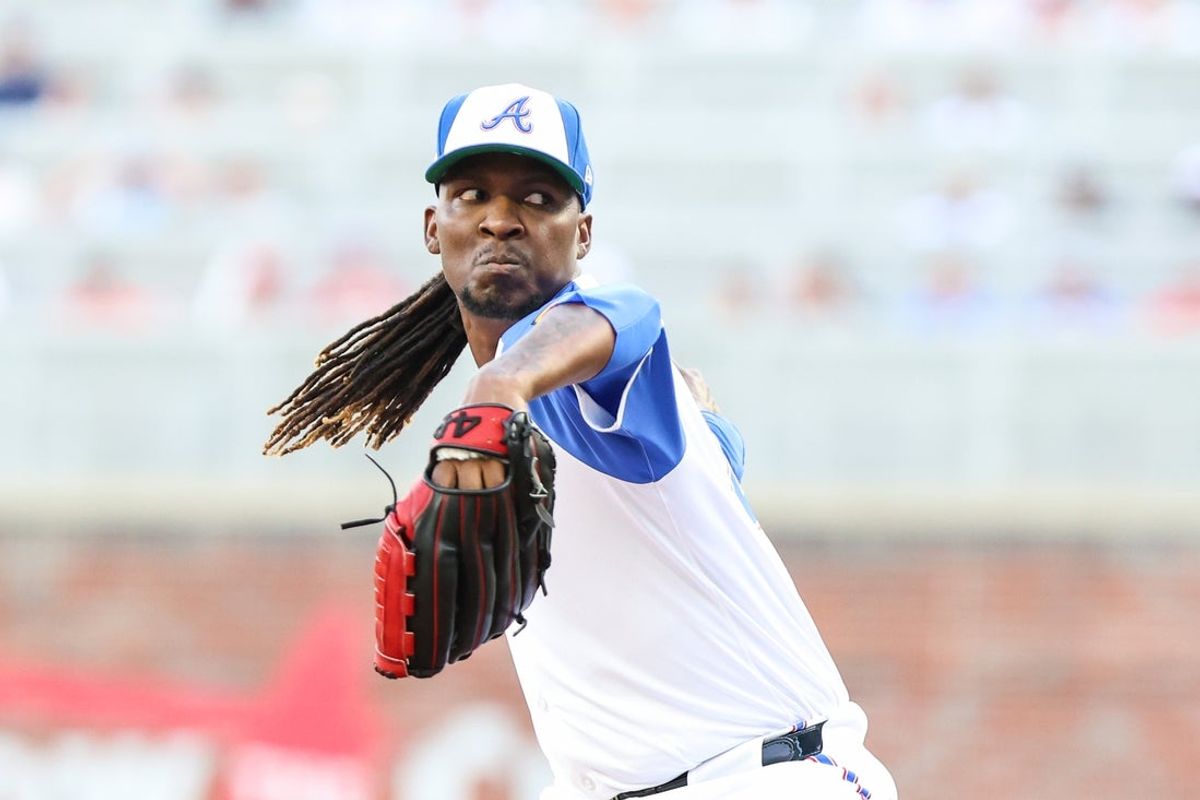 Jun 14, 2025; Cumberland, Georgia, USA; Atlanta Braves pitcher Rafael Montero (48) pitches the ball against the Colorado Rockies during the eighth inning at Truist Park. Mandatory Credit: Jordan Godfree-Imagn Images