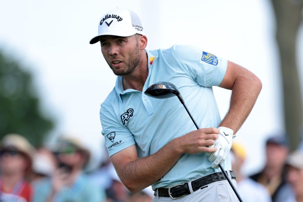 Jun 14, 2025; Oakmont, Pennsylvania, USA; Sam Burns plays his shot from the 15th tee during the third round of the U.S. Open golf tournament. Mandatory Credit: Bill Streicher-Imagn Images