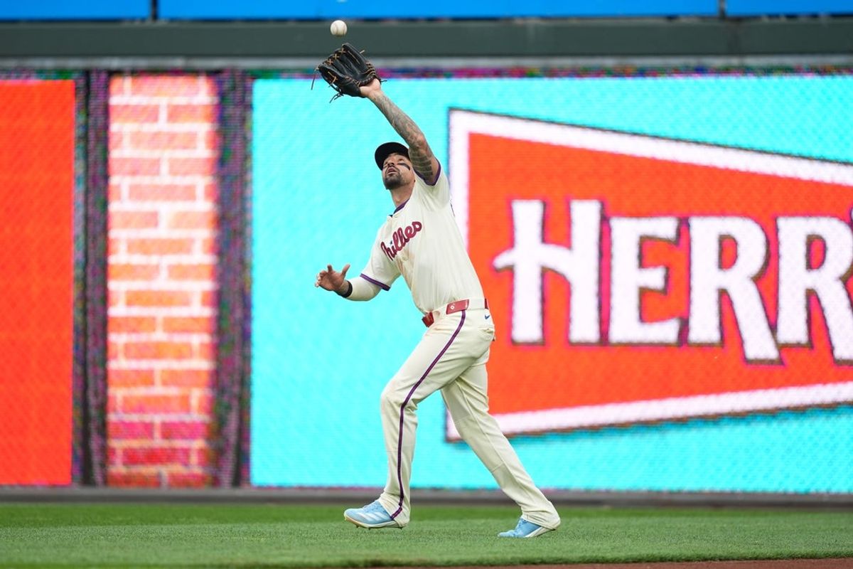 Jun 14, 2025; Philadelphia, Pennsylvania, USA; Philadelphia Phillies outfielder Nick Castellanos (8) fields a fly ball against the Toronto Blue Jays in the sixth inning at Citizens Bank Park. Mandatory Credit: Kyle Ross-Imagn Images