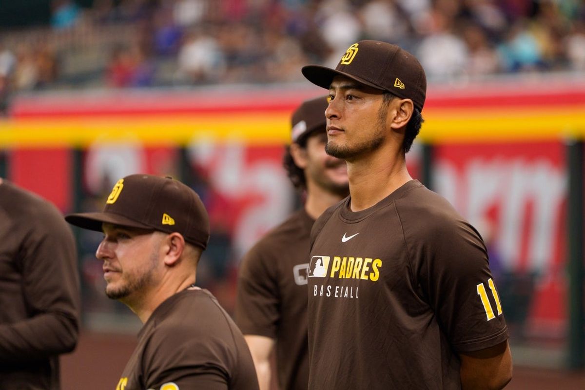 Jun 14, 2025; Phoenix, Arizona, USA; San Diego Padres pitcher Yu Darvish (11) watches before the start a game against the Arizona Diamondbacks at Chase Field. Mandatory Credit: Allan Henry-Imagn Images