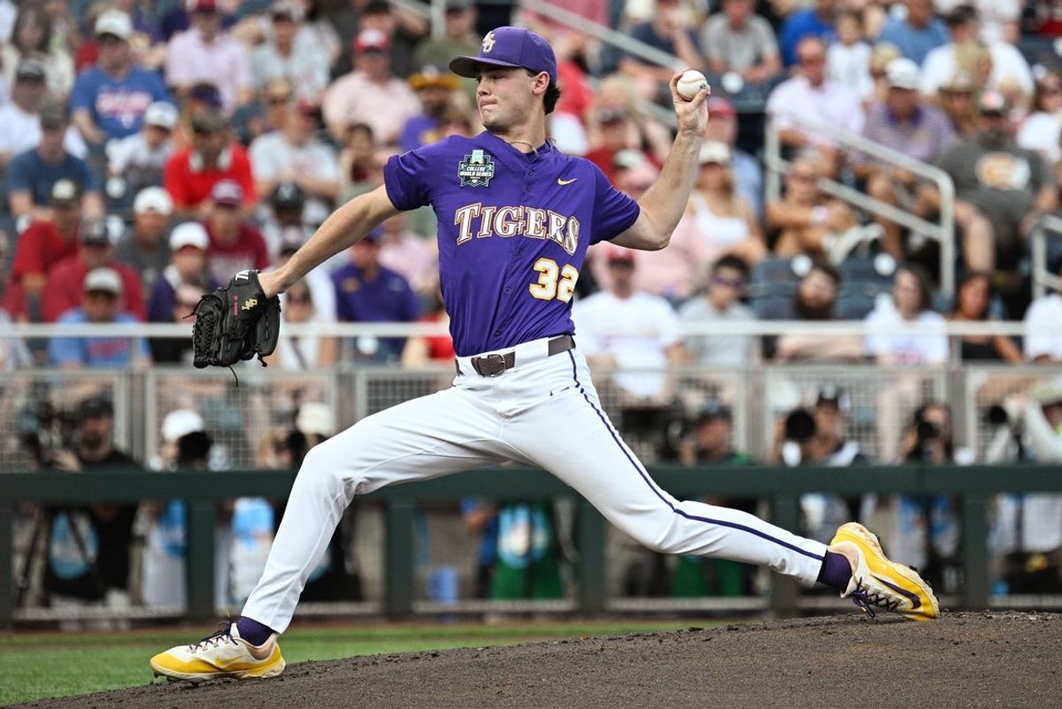 Jun 14, 2025; Omaha, Neb, USA;  LSU Tigers starting pitcher Kade Anderson (32) throws against the Arkansas Razorbacks during the first inning at Charles Schwab Field. Mandatory Credit: Steven Branscombe-Imagn Images