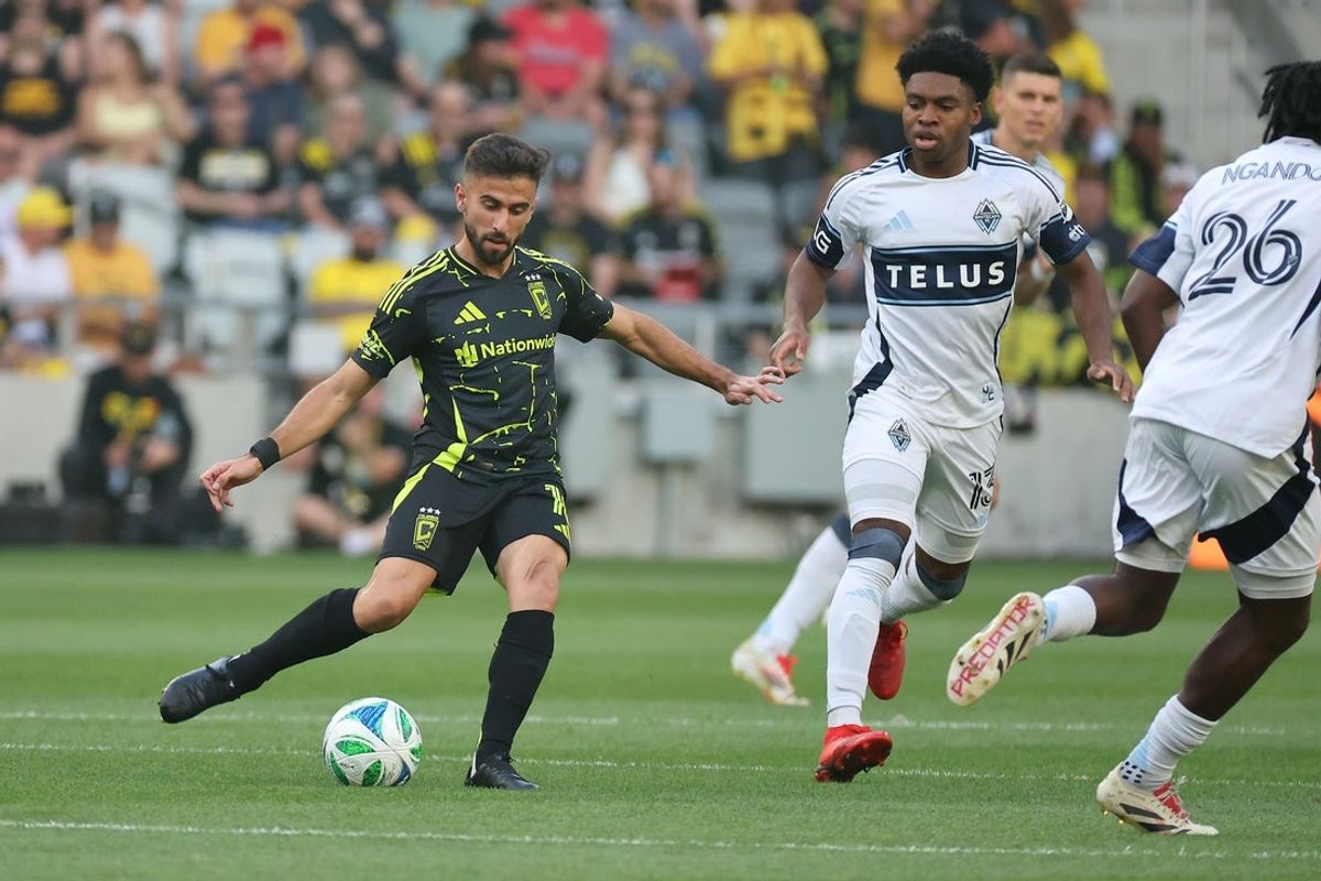 Jun 14, 2025; Columbus, Ohio, USA;  Columbus Crew forward Diego Rossi (10) passes the ball during the first half against the Vancouver Whitecaps at Lower.com Field. Mandatory Credit: Joseph Maiorana-Imagn Images