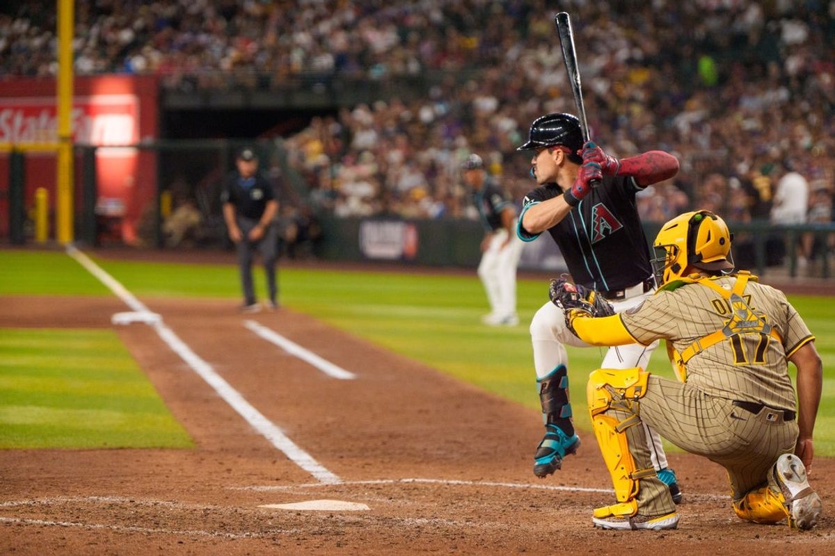 Jun 14, 2025; Phoenix, Arizona, USA; Arizona Diamondbacks outfielder Corbin Carroll (7) at bat in the seventh inning against the San Diego Padres at Chase Field. Mandatory Credit: Allan Henry-Imagn Images