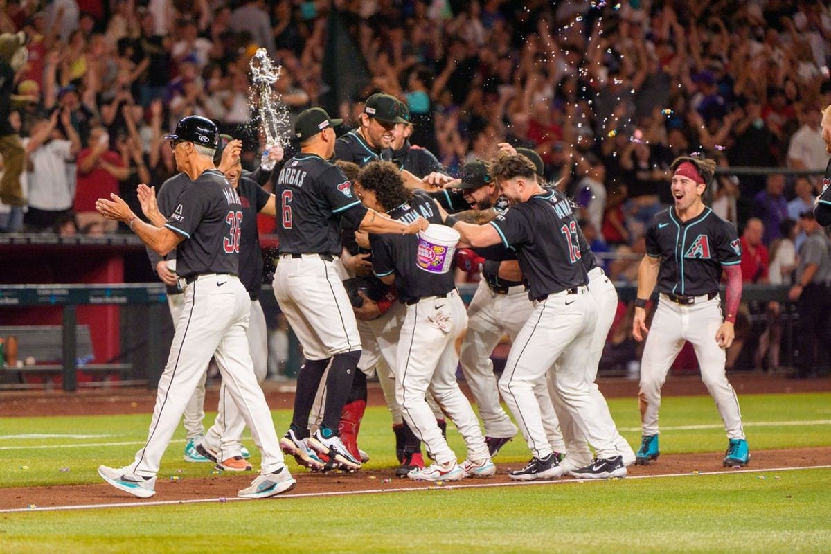 Jun 14, 2025; Phoenix, Arizona, USA; A general view as the Arizona Diamondbacks team celebrates a ninth inning come back to beat the San Diego Padres 8-7 at Chase Field. Mandatory Credit: Allan Henry-Imagn Images