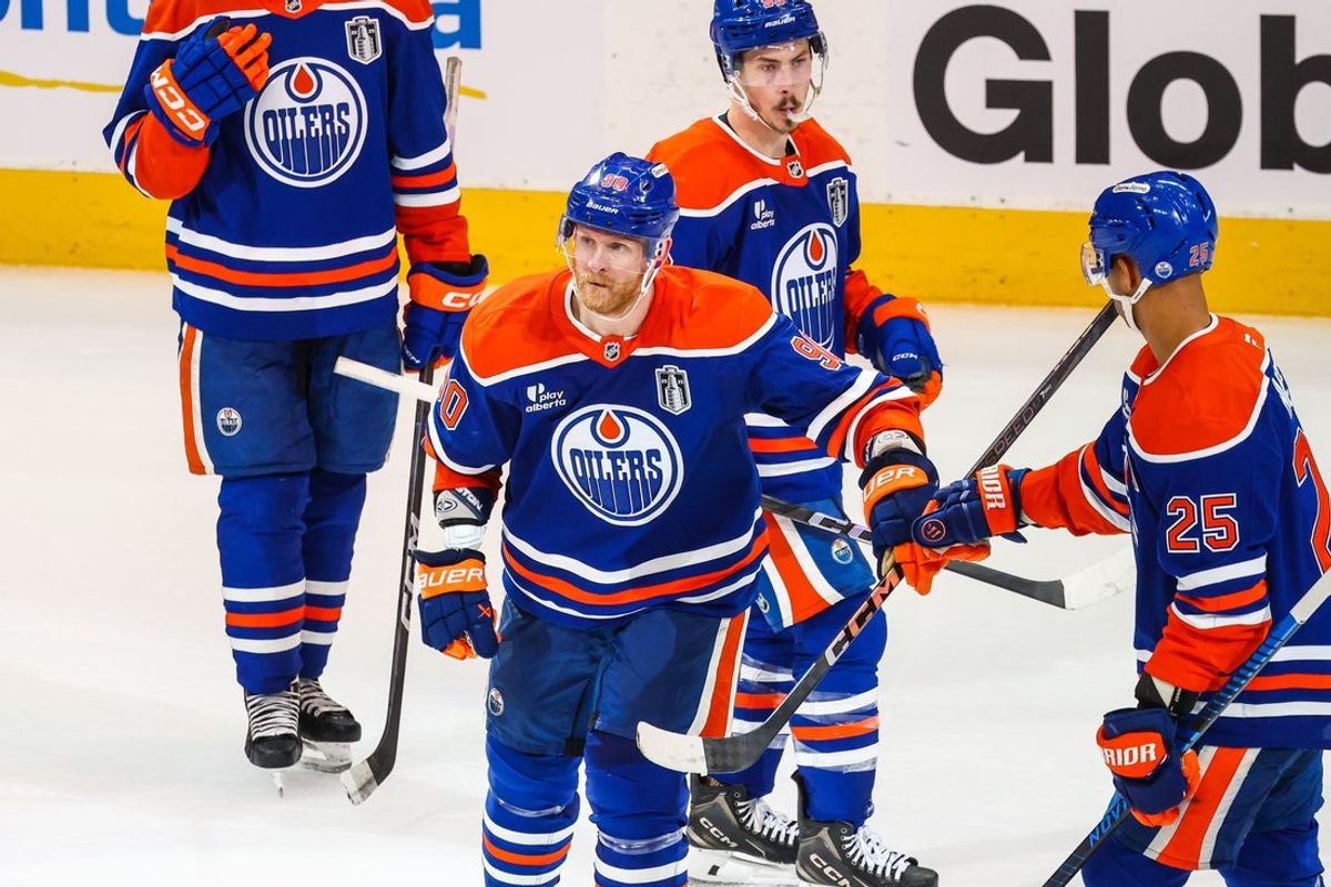 Jun 14, 2025; Edmonton, Alberta, CAN; Edmonton Oilers right wing Corey Perry (90) celebrates his goal with teammates against the Florida Panthers during the third period in game five of the 2025 Stanley Cup Final at Rogers Place. Mandatory Credit: Sergei Belski-Imagn Images