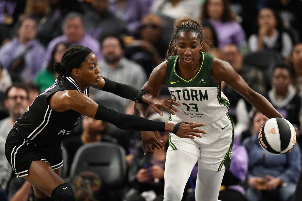 Jun 14, 2025; San Francisco, California, USA; Seattle Storm forward Ezi Magbegor (13) dribbles against Golden State Valkyries center Temi Fagbenle (14) in the third quarter at Chase Center. Mandatory Credit: Eakin Howard-Imagn Images