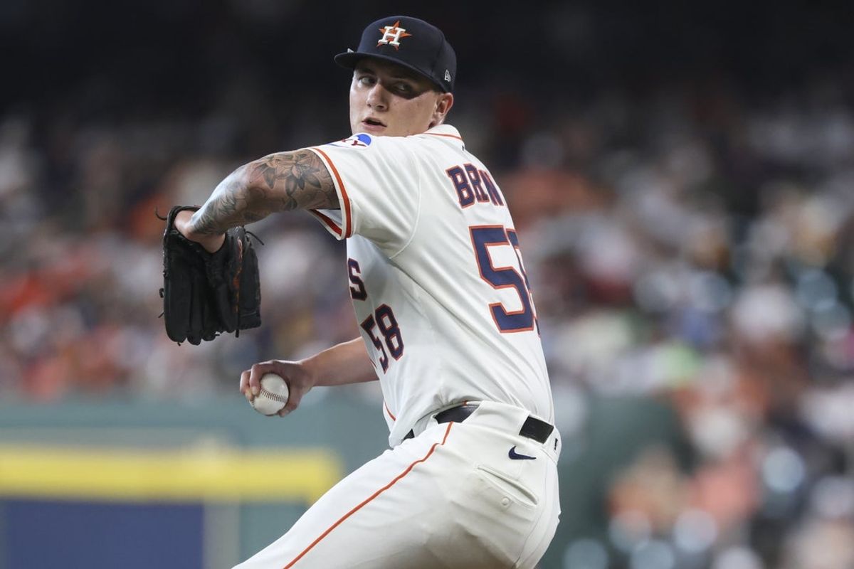 Jun 14, 2025; Houston, Texas, USA; Houston Astros starting pitcher Hunter Brown (58) delivers a pitch during the fifth inning against the Minnesota Twins at Daikin Park. Mandatory Credit: Troy Taormina-Imagn Images