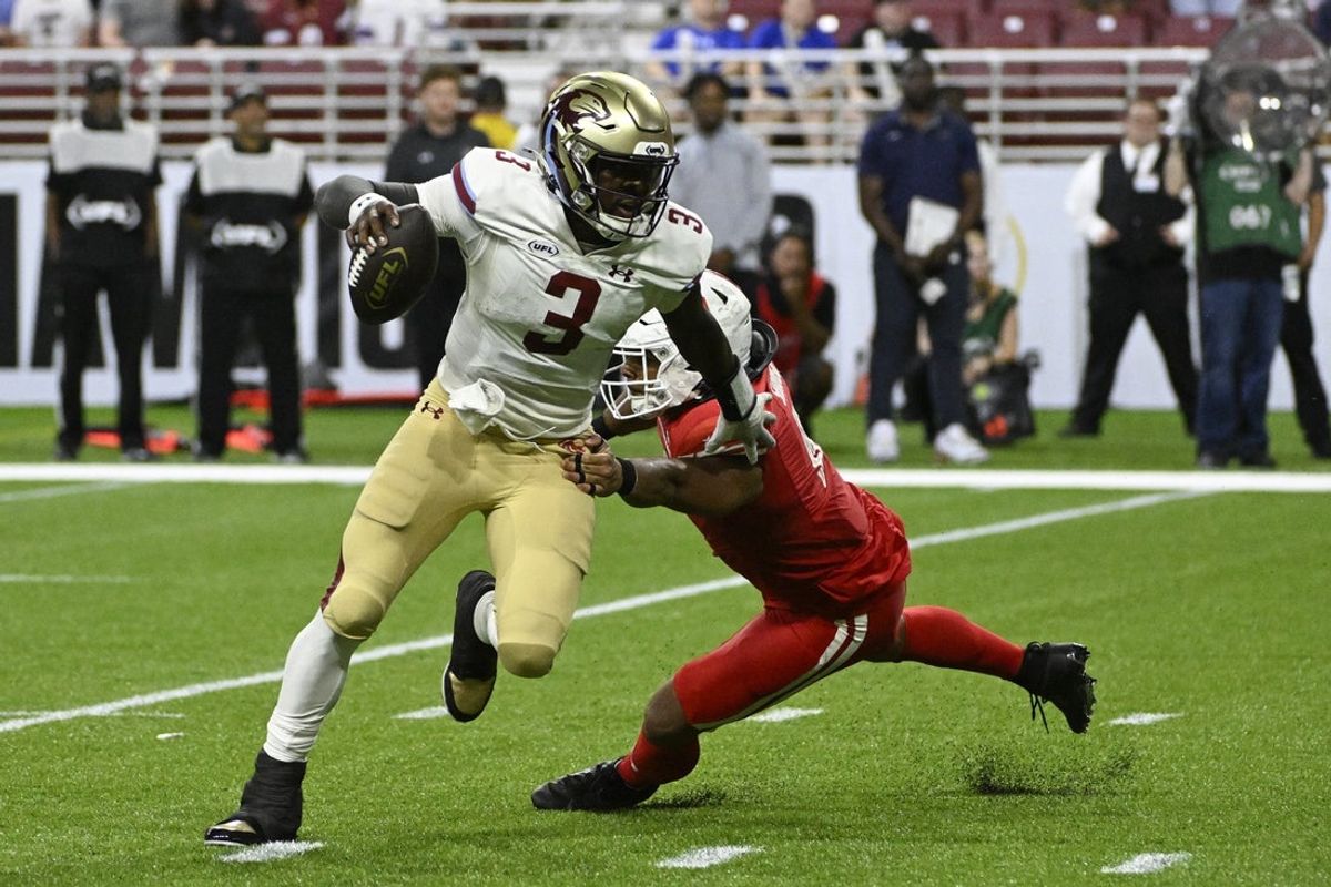 Jun 14, 2025; St. Louis, MO, USA; Michigan Panthers quarterback Bryce Perkins (3) scrambles against the DC Defenders during the fourth quarter of the 2025 UFL Championship at The Dome at America’s Center. Mandatory Credit: Jeff Le-Imagn Images