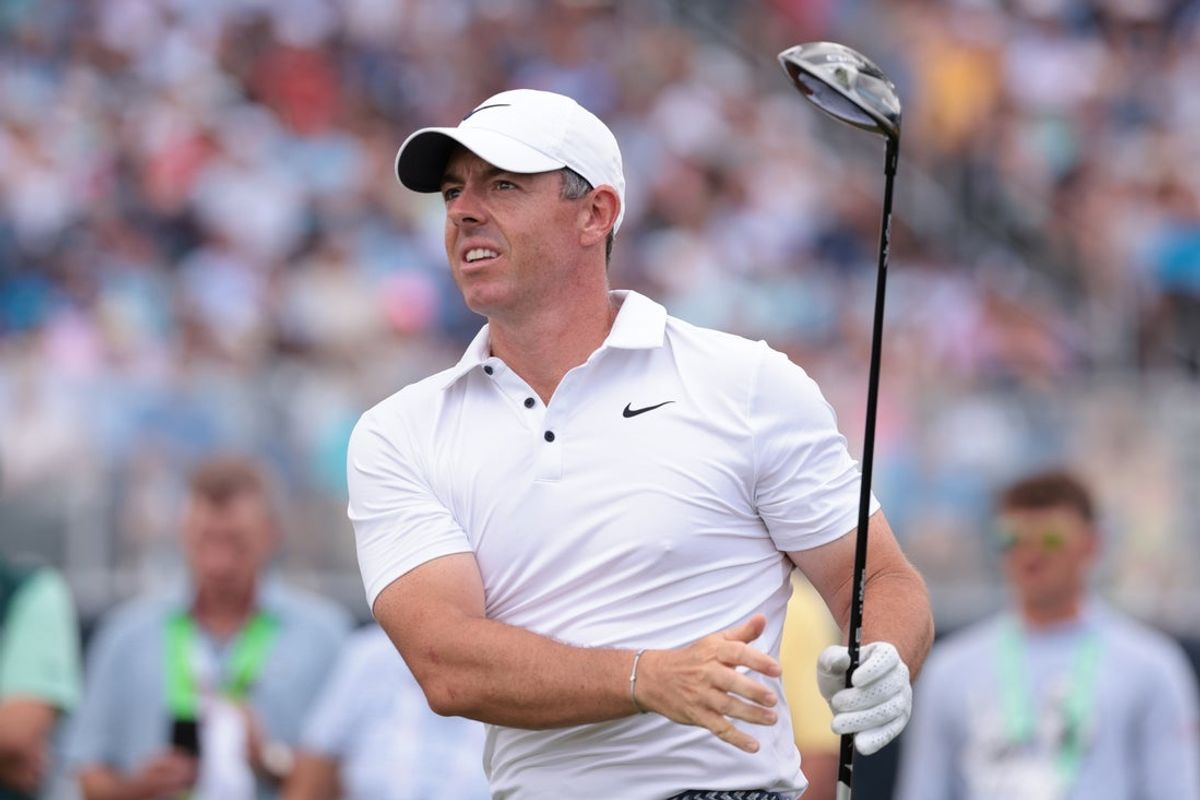 Jun 15, 2025; Oakmont, Pennsylvania, USA; Rory McIlroy plays his shot from the 12th tee during the final round of the U.S. Open golf tournament. Mandatory Credit: Bill Streicher-Imagn Images
