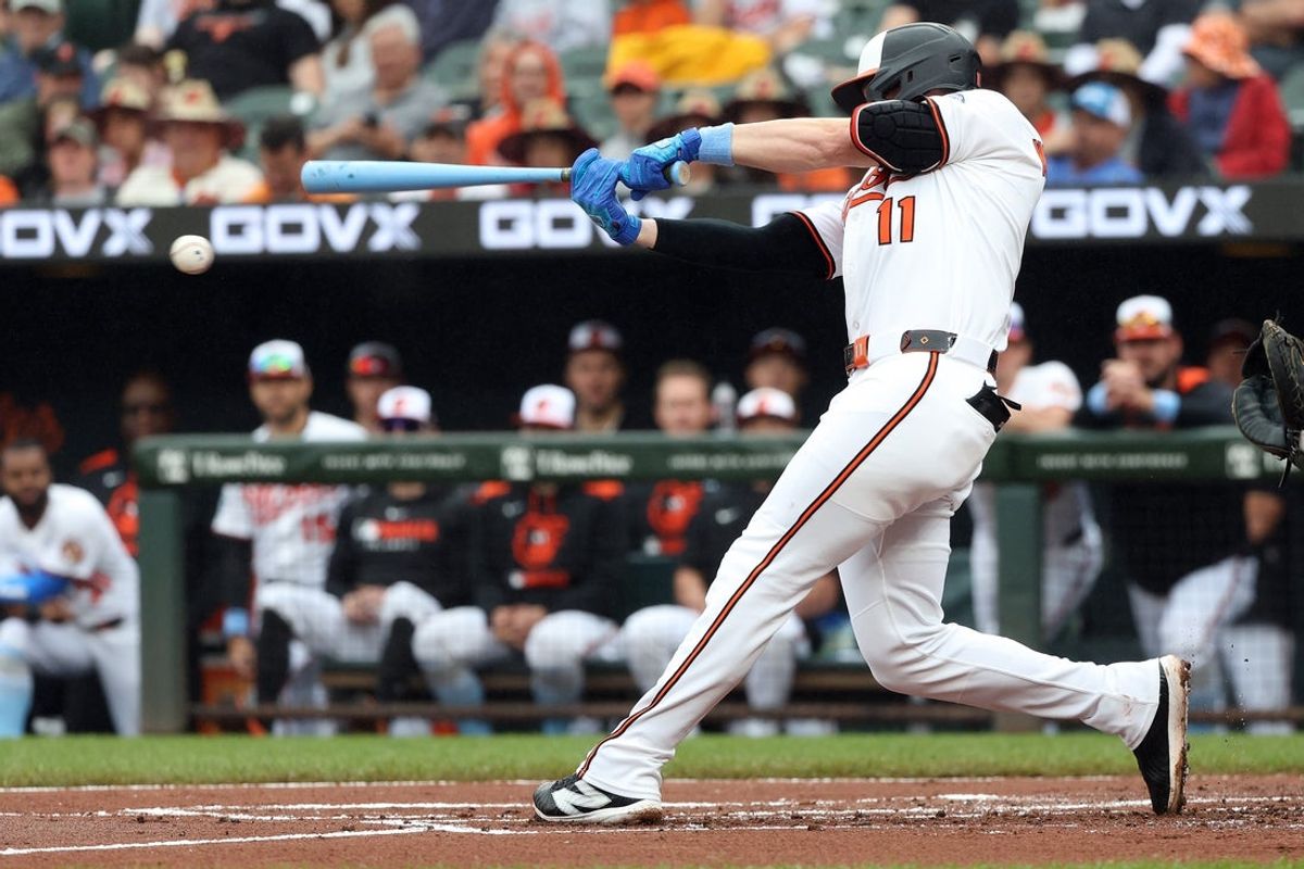 Jun 15, 2025; Baltimore, Maryland, USA; Baltimore Orioles third baseman Jordan Westburg (11) reaches first on a fielding error during the first inning against the Los Angeles Angels at Oriole Park at Camden Yards. Mandatory Credit: Daniel Kucin Jr.-Imagn Images