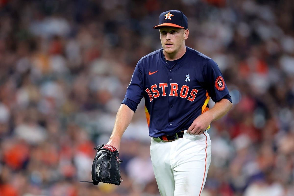 Jun 15, 2025; Houston, Texas, USA; Houston Astros starting pitcher Brandon Walter (60) walks to the dugout after retiring the side against the Minnesota Twins during the sixth inning at Daikin Park. Mandatory Credit: Erik Williams-Imagn Images
