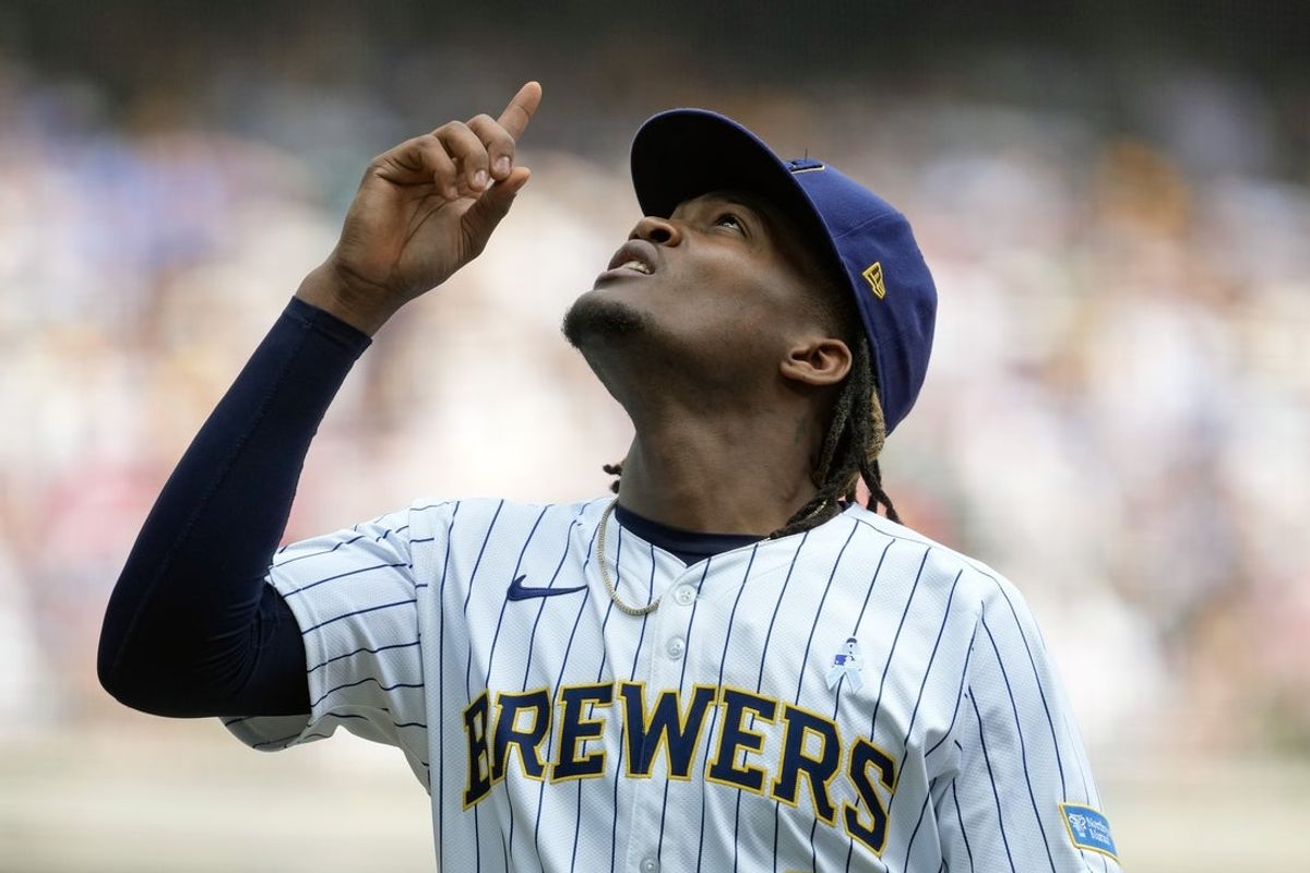 Jun 15, 2025; Milwaukee, Wisconsin, USA;  Milwaukee Brewers pitcher Abner Uribe (45) reacts after earning the final out of the seventh inning against the St. Louis Cardinals at American Family Field. Mandatory Credit: Jeff Hanisch-Imagn Images