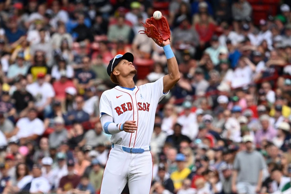 Jun 15, 2025; Boston, Massachusetts, USA; Boston Red Sox second baseman Kristian Campbell (28) makes a catch for an out against the New York Yankees during the seventh inning at Fenway Park. Mandatory Credit: Eric Canha-Imagn Images