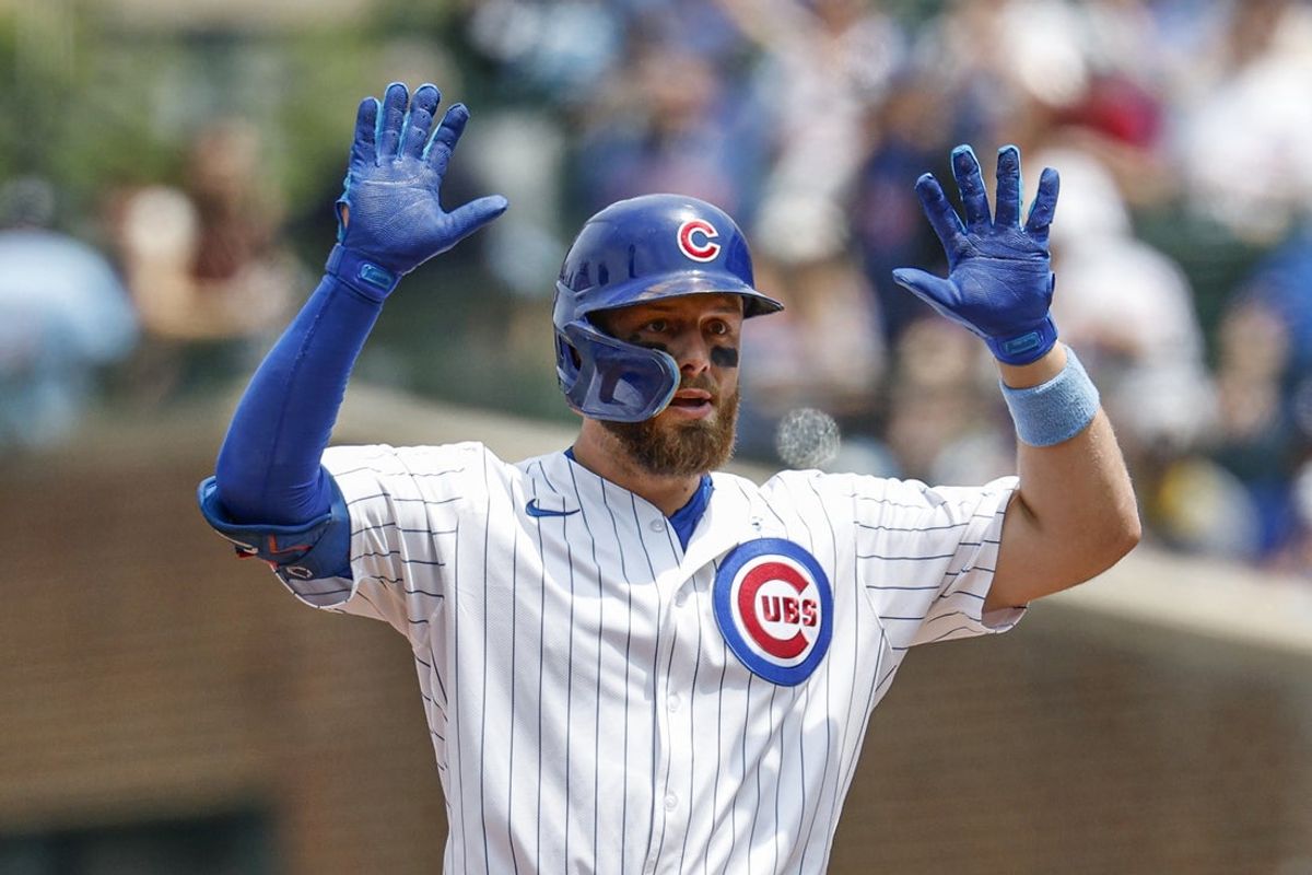 Jun 15, 2025; Chicago, Illinois, USA; Chicago Cubs first baseman Michael Busch (29) celebrates after hitting a double against the Pittsburgh Pirates during the first inning at Wrigley Field. Mandatory Credit: Kamil Krzaczynski-Imagn Images