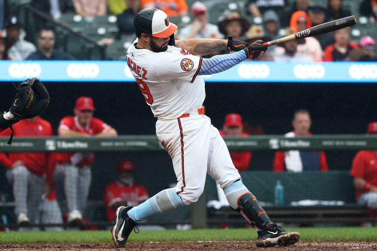 Jun 15, 2025; Baltimore, Maryland, USA; Baltimore Orioles catcher Gary Sanchez (99) hits a grand slam during the seventh inning against the Los Angeles Angels at Oriole Park at Camden Yards. Mandatory Credit: Daniel Kucin Jr.-Imagn Images
