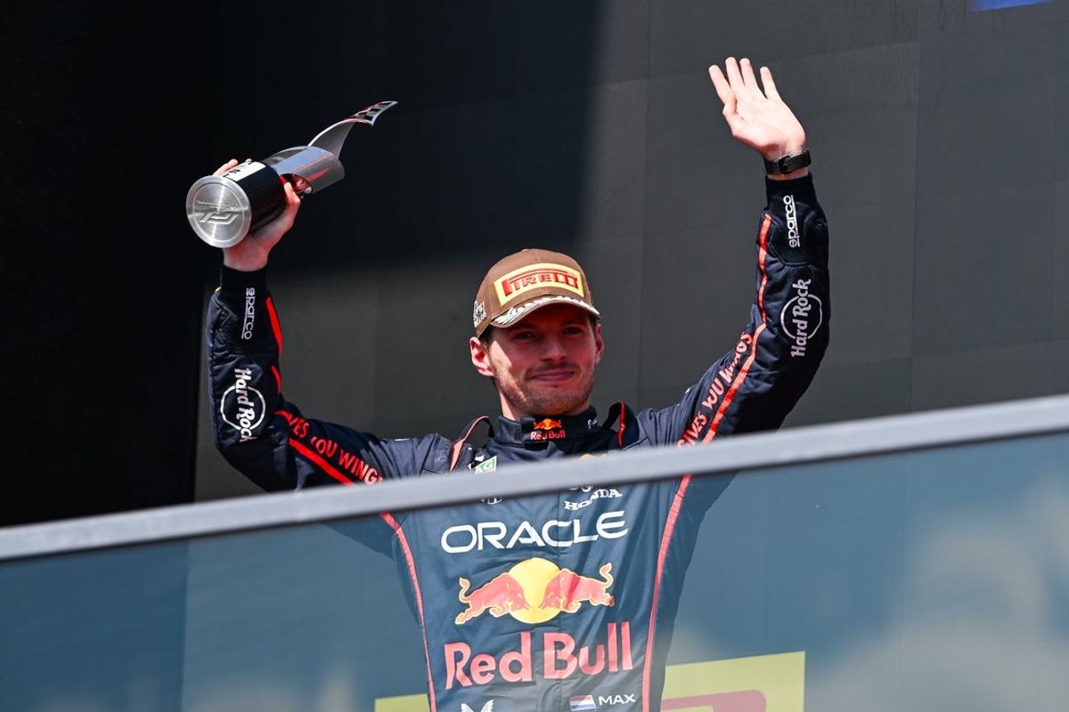 Jun 15, 2025; Montreal, Quebec, Canada; Second place Red Bull Racing driver Max Verstappen (1) reacts after receiving his trophy at the F1 Canadian Grand Prix at Circuit Gilles-Villeneuve. Mandatory Credit: David Kirouac-Imagn Images
