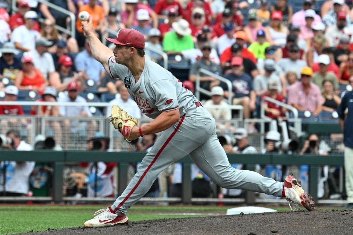 Jun 16, 2025; Omaha, Neb, USA;  Arkansas Razorbacks starting pitcher Gage Wood (14) throws against the Murray State Racers during the first inning at Charles Schwab Field. Mandatory Credit: Steven Branscombe-Imagn Images