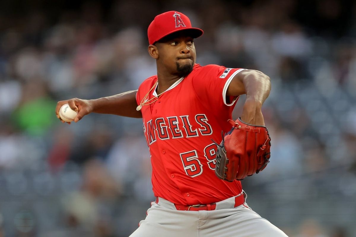 Jun 16, 2025; Bronx, New York, USA; Los Angeles Angels starting pitcher Jose Soriano (59) pitches against the New York Yankees during the first inning at Yankee Stadium. Mandatory Credit: Brad Penner-Imagn Images