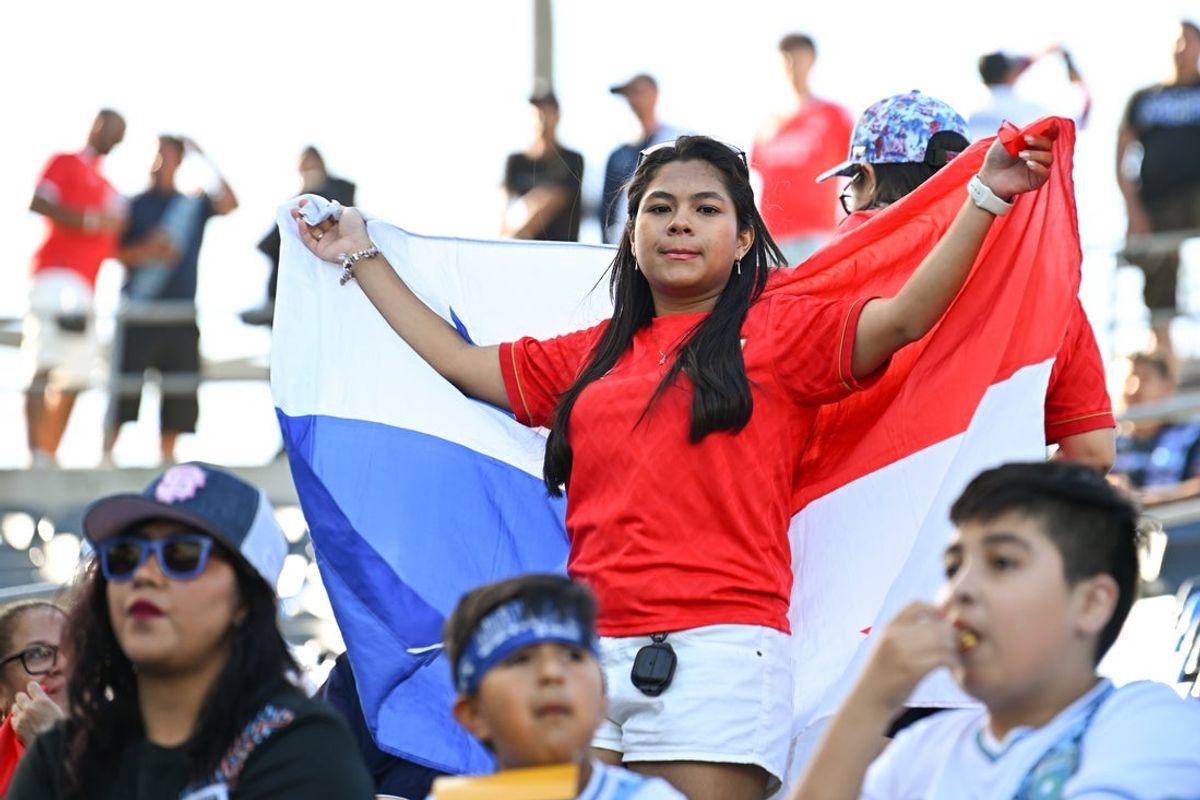 Jun 16, 2025; Carson, California, USA; A Panama fan holds up a flag during a group stage match against Guadeloupe of the 2025 Gold Cup at Dignity Health Sports Park. Mandatory Credit: Jonathan Hui-Imagn Images