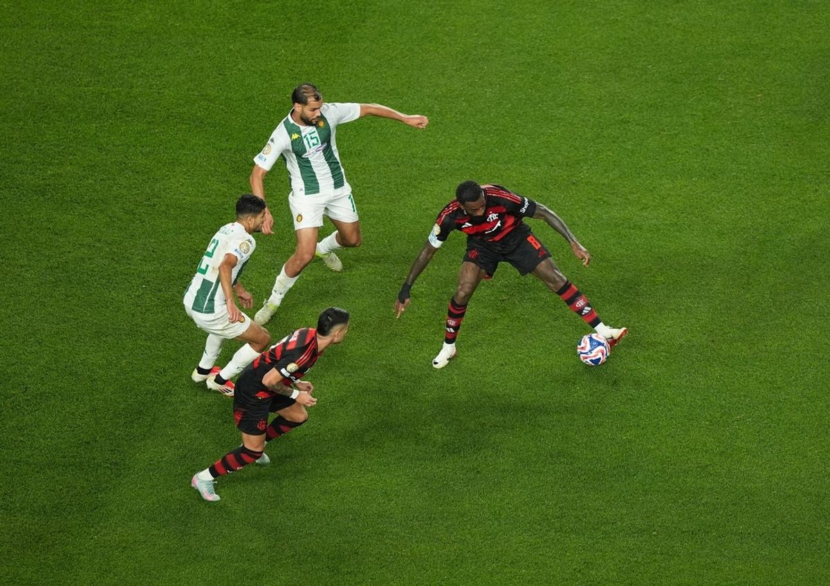 Jun 16, 2025; Philadelphia, Pennsylvania, USA; CR Flamengo midfielder Gerson (8) and Esperance Sportive De Tunisie defender Mohamed Amine Tougai (15) battle for control of the ball during the second half in a group stage match of the 2025 FIFA Club World Cup at Lincoln Financial Field. Mandatory Credit: Kyle Ross-Imagn Images