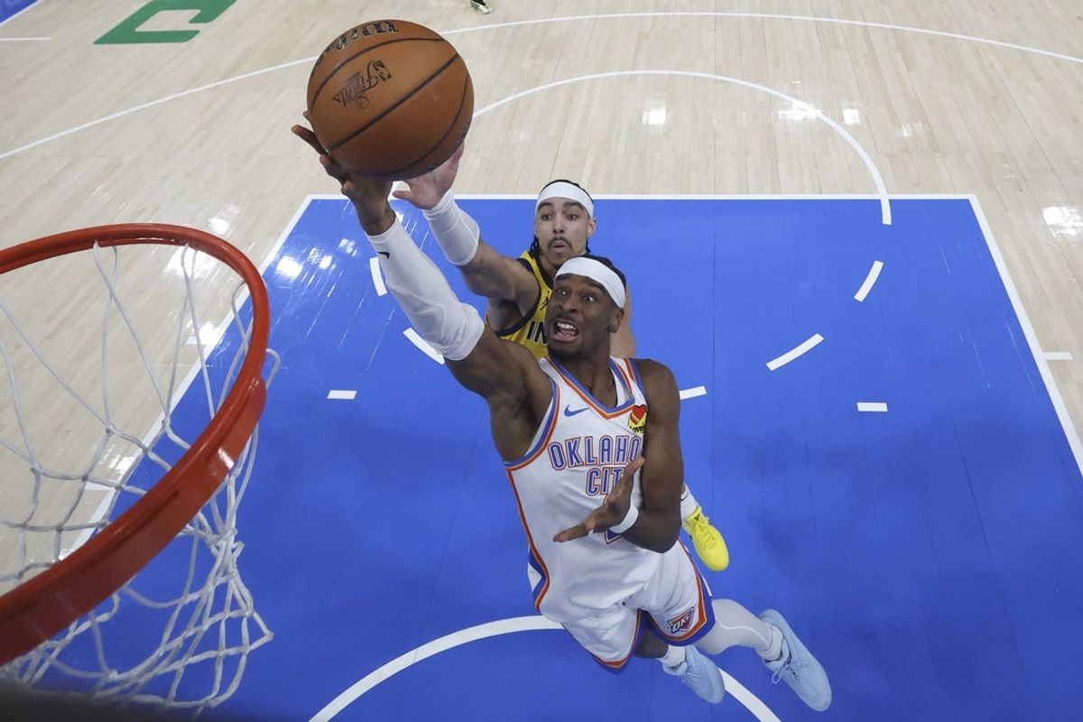 Jun 16, 2025; Oklahoma City, Oklahoma, USA; Oklahoma City Thunder guard Shai Gilgeous-Alexander (2) shoots against Indiana Pacers guard Andrew Nembhard (2) during game five of the 2025 NBA Finals at Paycom Center. Mandatory Credit: Matthew Stockman/Pool Photo via Imagn Images
