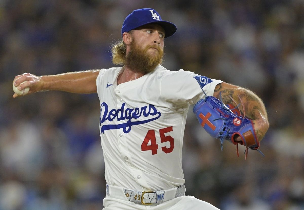 Jun 16, 2025; Los Angeles, California, USA;  Los Angeles Dodgers relief pitcher Michael Kopech (45) delivers to the plate in the seventh inning against the San Diego Padres at Dodger Stadium. Mandatory Credit: Jayne Kamin-Oncea-Imagn Images