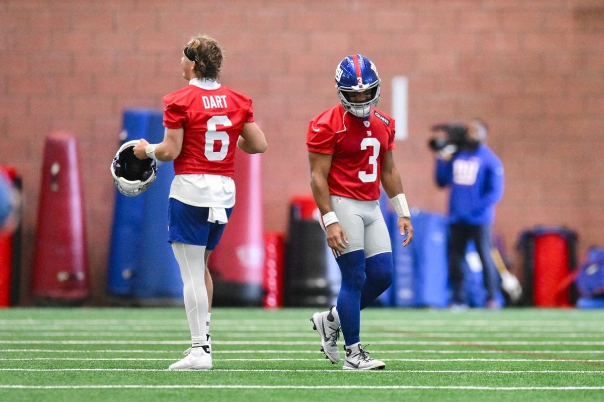 New York Giants quarterback Jaxson Dart (6) and quarterback Russell Wilson (3) interact during minicamp at Quest Diagnostics Training Center. Mandatory Credit: John Jones-Imagn Images