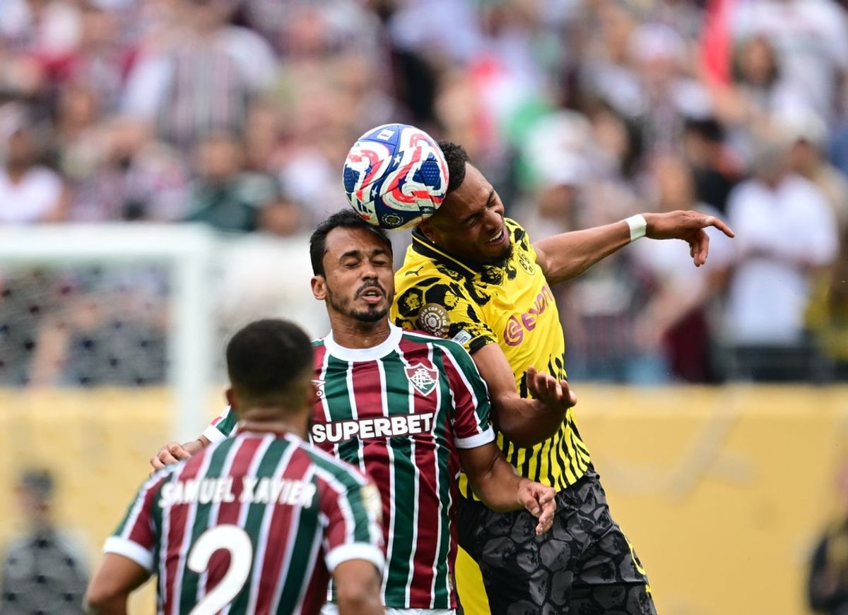 Jun 17, 2025; East Rutherford, New Jersey, USA; Fluminense FC midfielder Lima (45) and Borussia Dortmund midfielder Felix Nmecha (8) battle for control of a header during the second half in a group stage match of the 2025 FIFA Club World Cup at MetLife Stadium. Mandatory Credit: Mark Smith-Imagn Images