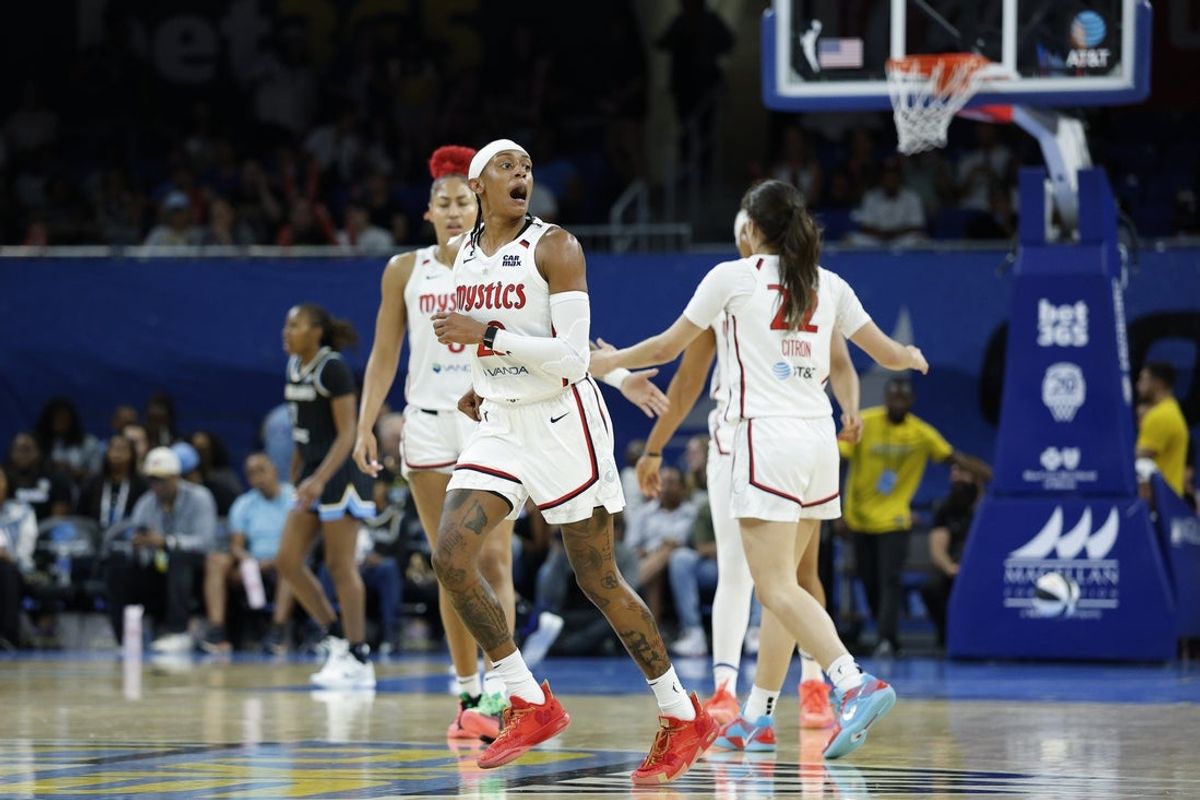 Jun 17, 2025; Chicago, Illinois, USA; Washington Mystics guard Brittney Sykes (20) reacts after scoring against the Chicago Sky during the first half of a WNBA game at Wintrust Arena. Mandatory Credit: Kamil Krzaczynski-Imagn Images