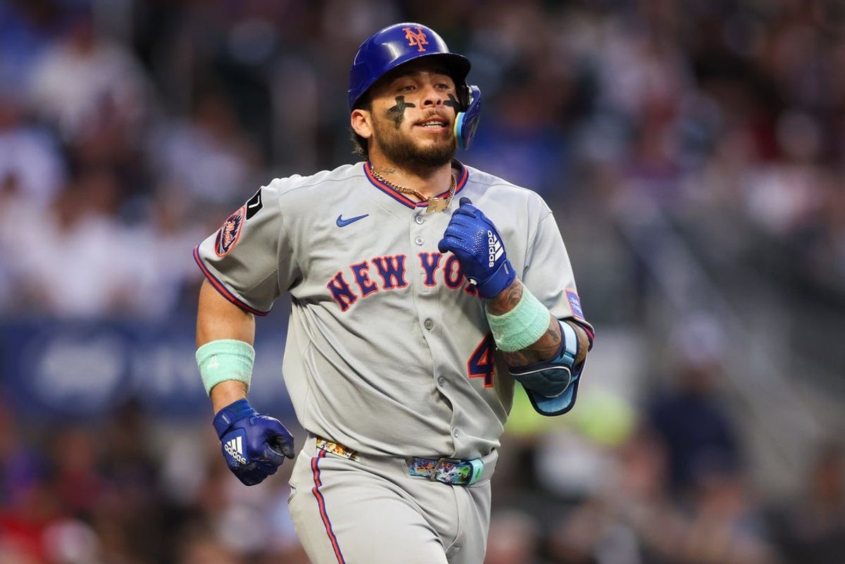 Jun 17, 2025; Atlanta, Georgia, USA; New York Mets catcher Francisco Alvarez (4) walks against the Atlanta Braves in the second inning at Truist Park. Mandatory Credit: Brett Davis-Imagn Images