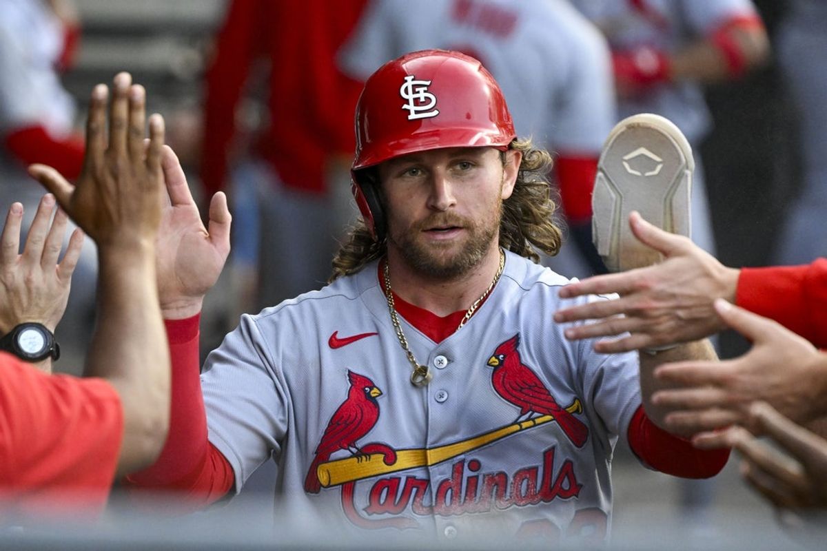 Jun 17, 2025; Chicago, Illinois, USA;  St. Louis Cardinals second baseman Brendan Donovan (33) celebrates in the dugout after he scores during the second inning against the Chicago White Sox at Rate Field. Mandatory Credit: Matt Marton-Imagn Images