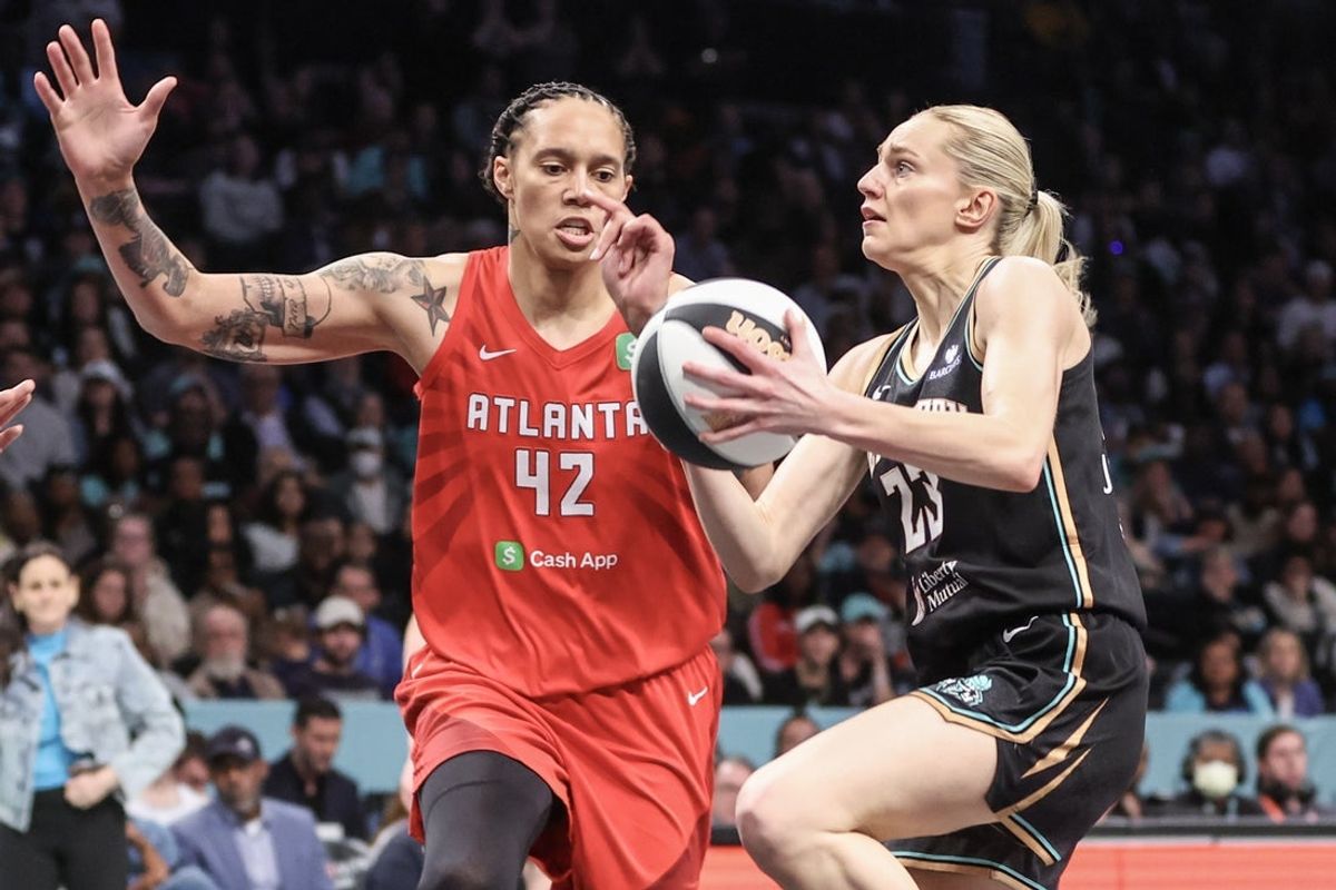 Jun 17, 2025; Brooklyn, New York, USA;  New York Liberty guard Marine Johannes (23) looks to drive past Atlanta Dream center Brittney Griner (42) in the fourth quarter at Barclays Center. Mandatory Credit: Wendell Cruz-Imagn Images