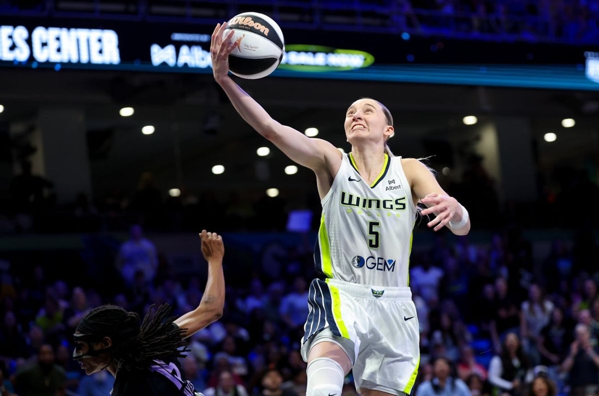 Jun 17, 2025; Arlington, Texas, USA;  Dallas Wings guard Paige Bueckers (5) shoots past Golden State Valkyries guard Tiffany Hayes (15) during the second half at College Park Center. Mandatory Credit: Kevin Jairaj-Imagn Images