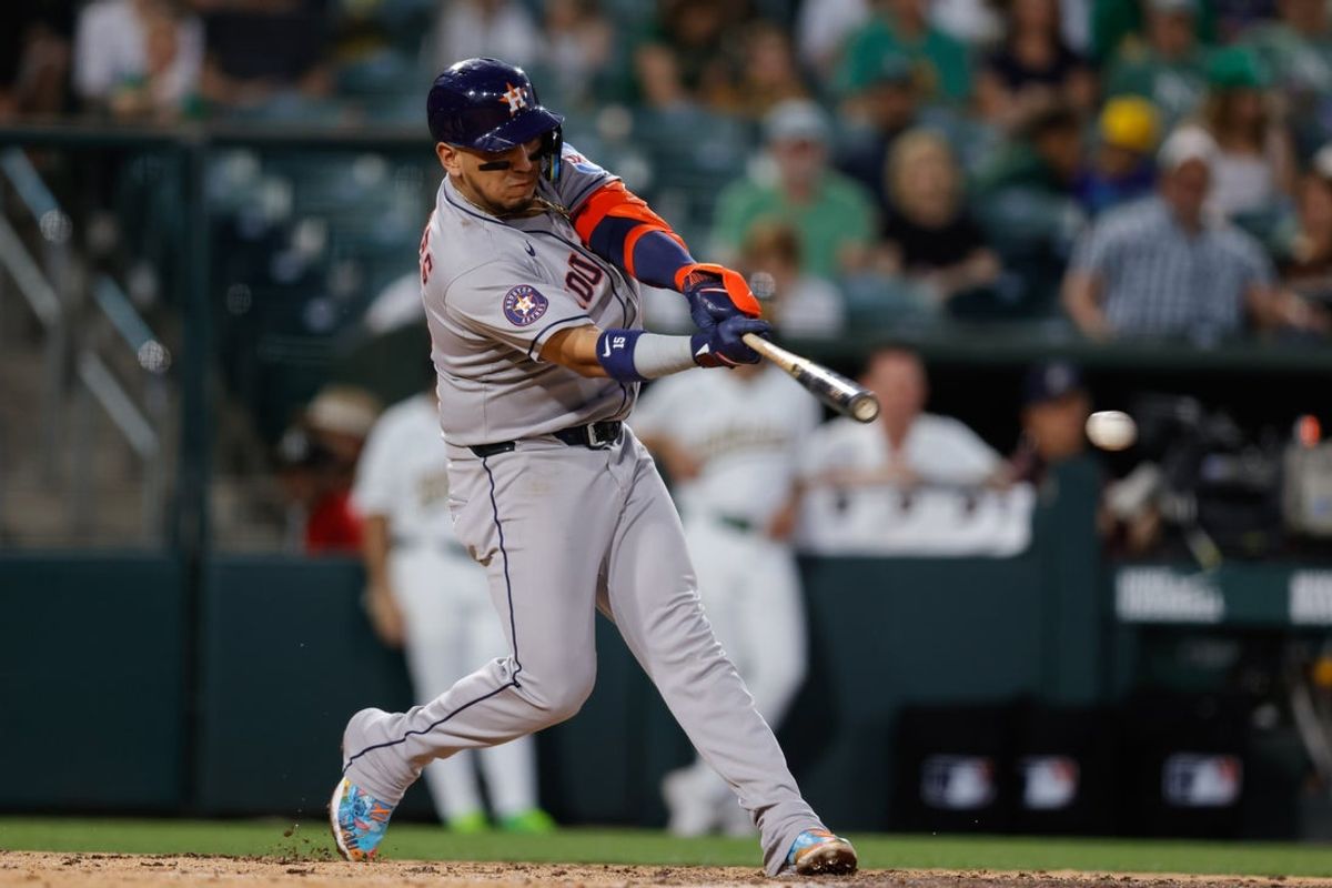 Jun 17, 2025; West Sacramento, California, USA; Houston Astros third baseman Isaac Paredes (15) hits a two-run RBI single during the fifth inning against the Athletics at Sutter Health Park. Mandatory Credit: Sergio Estrada-Imagn Images