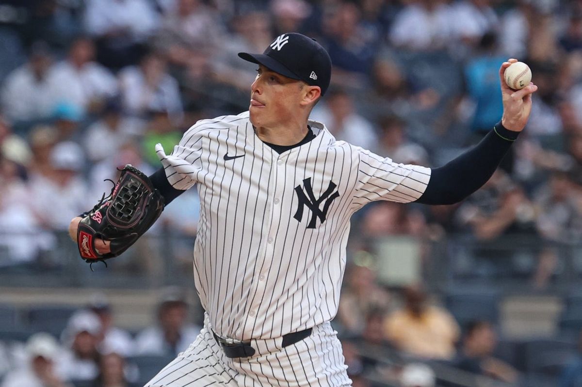Jun 18, 2025; Bronx, New York, USA; New York Yankees relief pitcher Ryan Yarbrough (33) delivers a pitch during the first inning against the Los Angeles Angels at Yankee Stadium. Mandatory Credit: Vincent Carchietta-Imagn Images