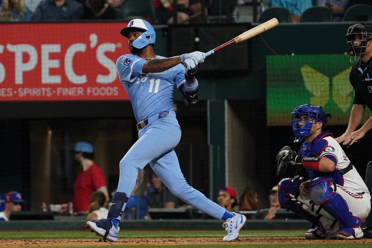 Jun 18, 2025; Arlington, Texas, USA; Kansas City Royals third baseman Maikel Garcia (11) hits a three-run home run during the third inning against the Texas Rangers at Globe Life Field. Mandatory Credit: Raymond Carlin III-Imagn Images