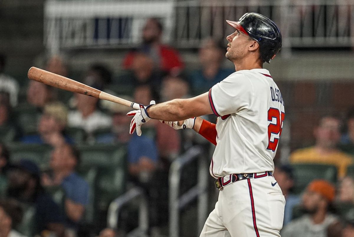 Jun 18, 2025; Cumberland, Georgia, USA; Atlanta Braves first baseman Matt Olson (28) hits a home run against the New York Mets during the seventh inning at Truist Park. Mandatory Credit: Dale Zanine-Imagn Images