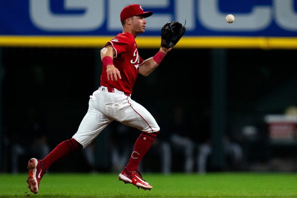 Cincinnati Reds second baseman Matt McLain (9) fields a ground ball before throwing Minnesota Twins first baseman Ty France (13) out in the third inning of the MLB game between Cincinnati Reds and Minnesota Twins at Great American Ball Park in Cincinnati on Wednesday, June 18, 2025.