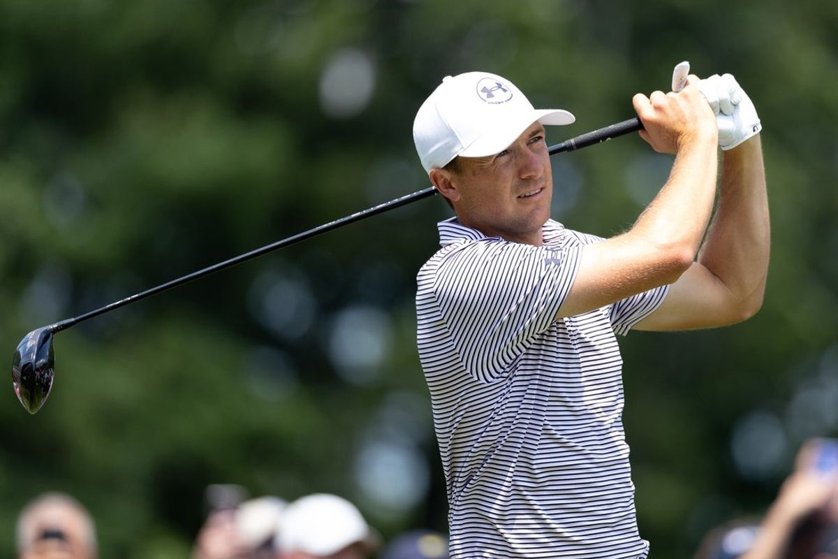 Jun 19, 2025; Cromwell, Connecticut, USA; Jordan Spieth plays his shot from the first tee during the first round of the Travelers Championship golf tournament. Mandatory Credit: Bill Streicher-Imagn Images