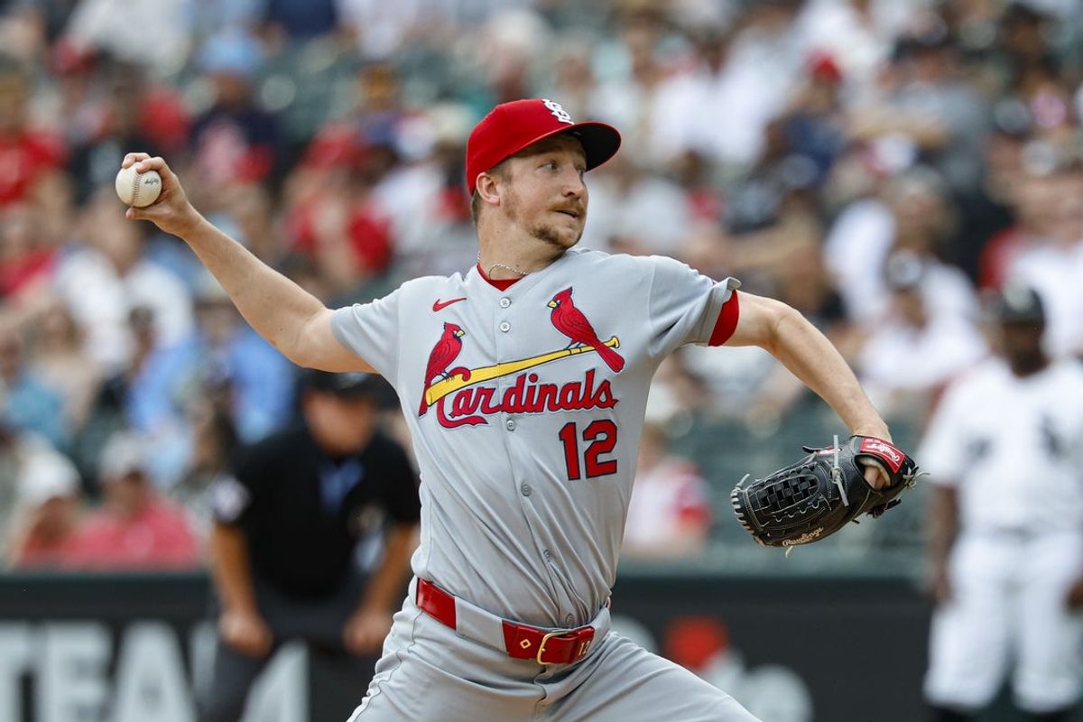 Jun 19, 2025; Chicago, Illinois, USA; St. Louis Cardinals starting pitcher Erick Fedde (12) delivers a pitch against the Chicago White Sox during the first inning of game one of the doubleheader at Rate Field. Mandatory Credit: Kamil Krzaczynski-Imagn Images